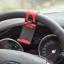 Car Steering Wheel Phone Socket Holder แท่นยึดโทรศัพท์ สมาร์ทโฟนติดพวงมาลัยรถยนต์ (ส่งฟรี)
