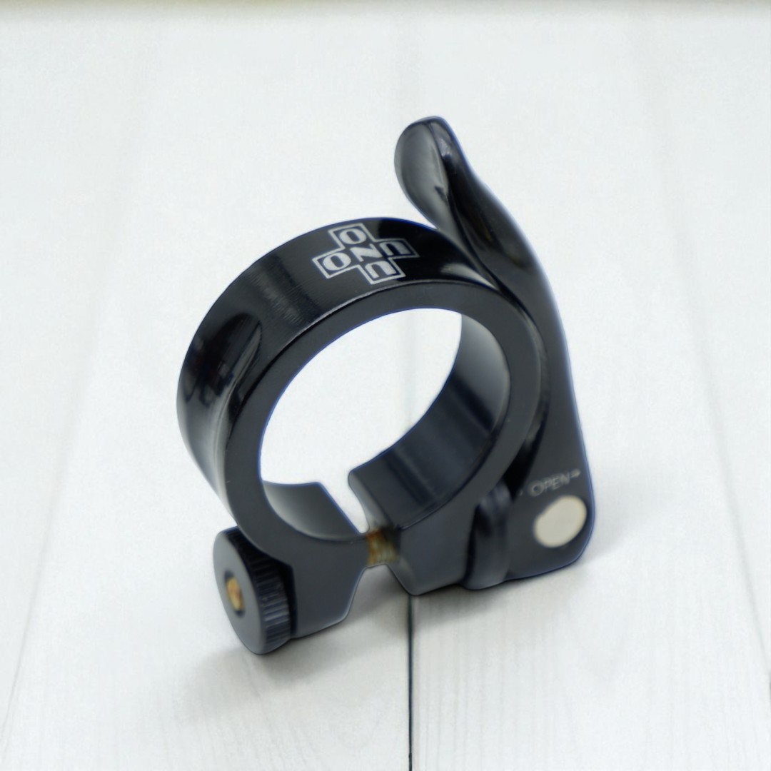 รัดหลักอานอลูมิเนียม UNO แบบน็อตยึด ขนาด 31.8 34.9