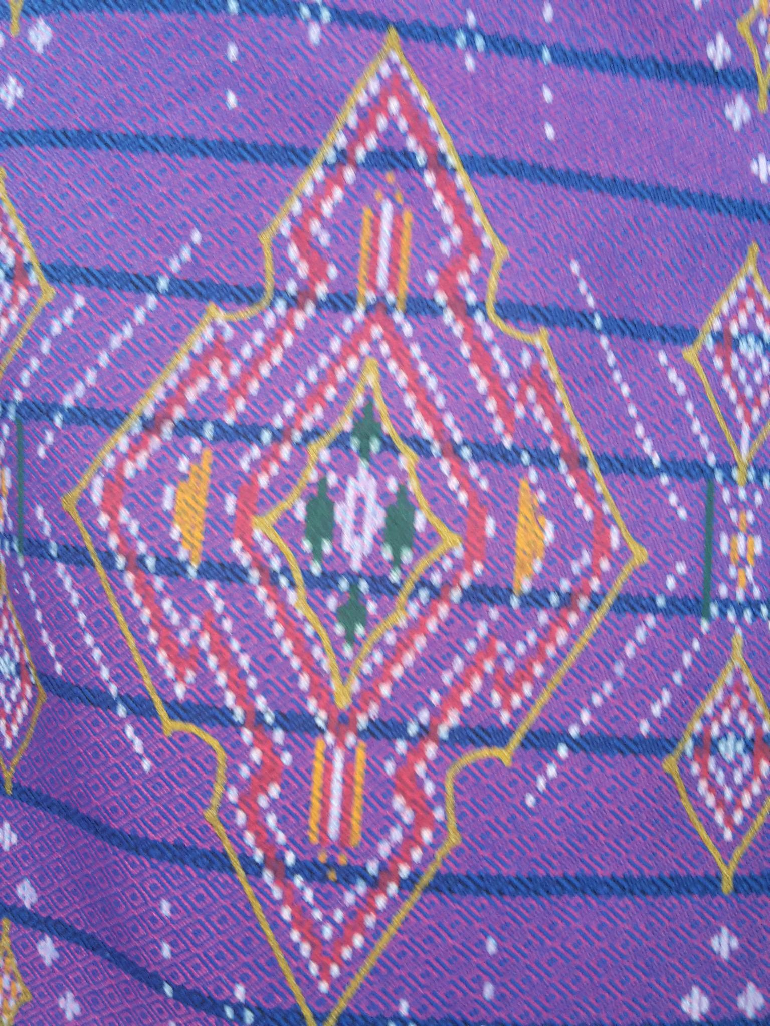 ผ้าซิ่นสำเร็จรูปผ้าซิ่นผ้าฝ้าย แบบป้ายแต่งจีบกระดุมปั้มลายเทพพนม ผ้าซิ่นตัดสำเร็จลายเทพพนมสีม่วง