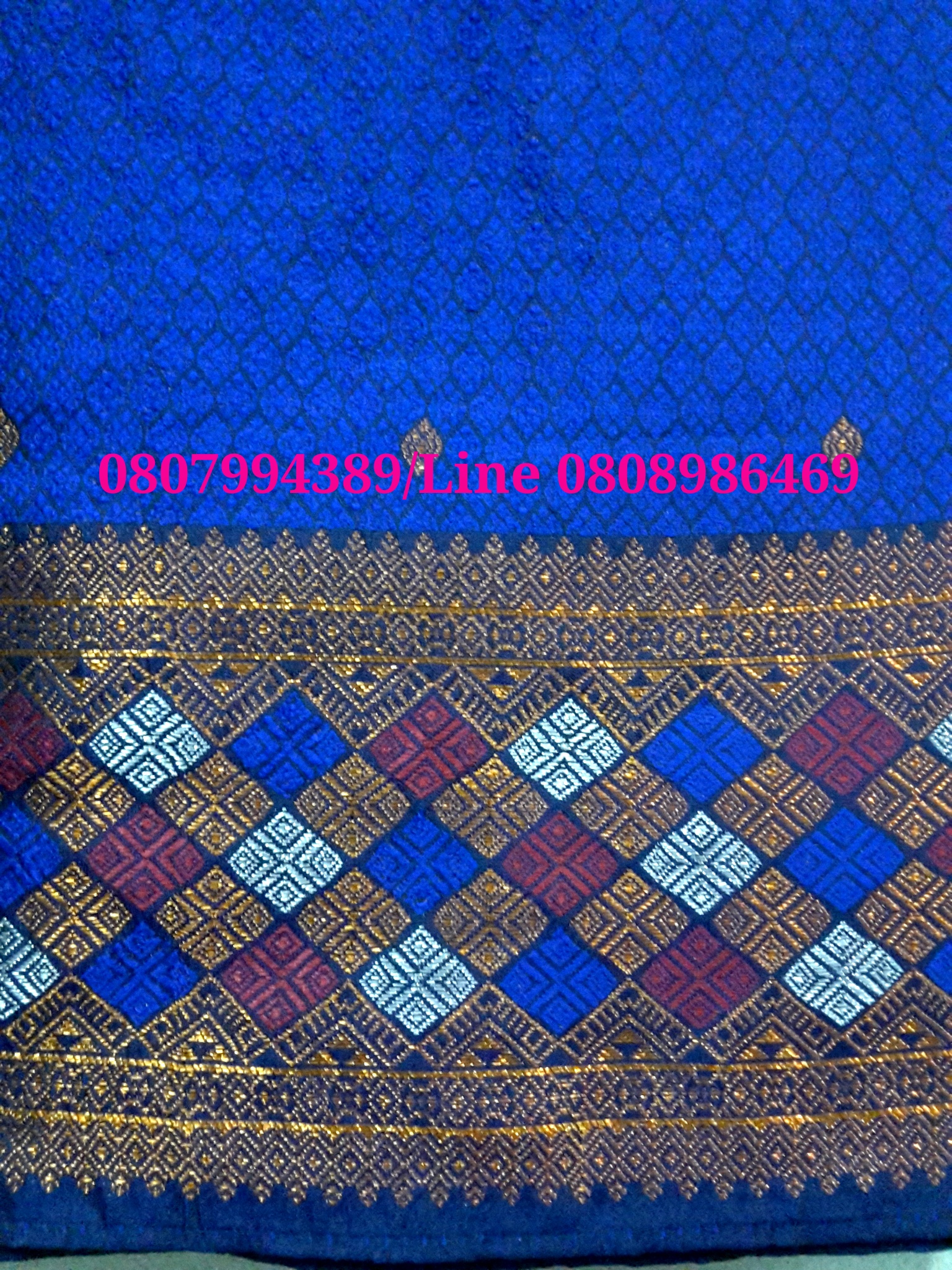 ผ้าซิ่นสำเร็จรูปผ้าซิ่นลาวแบบป้ายเลื่อนตะขอ ผ้าถุงสำเร็จรูป ผ้าซิ่นตีนจกไหมลาวสีน้ำเงินเมทอลลิค