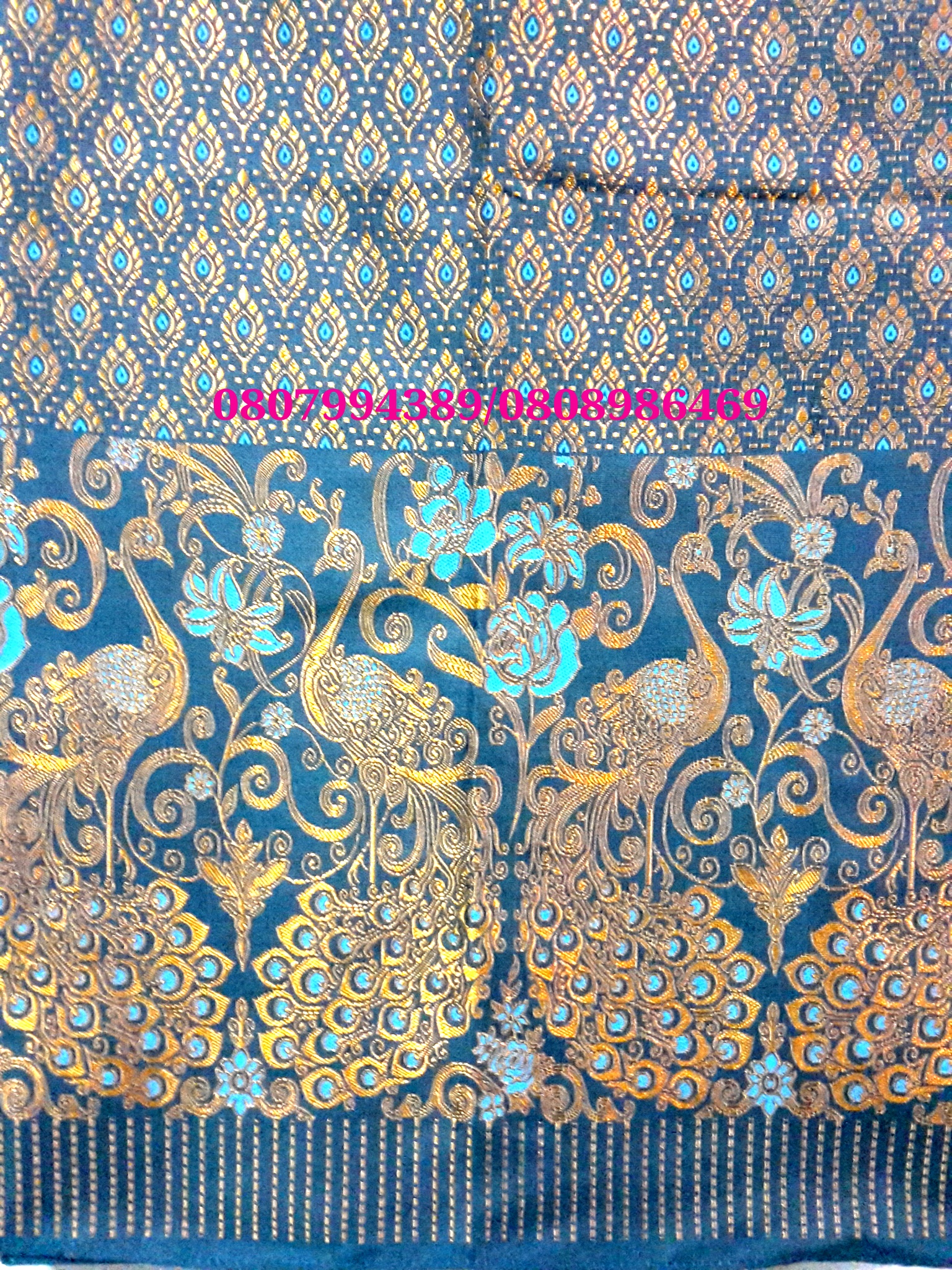 ผ้าซิ่นสำเร็จรูปผ้าซิ่นลาวแบบป้ายเลื่อนตะขอ ผ้าถุงสำเร็จรูป ผ้าซิ่นตีนจกไหมลาวสีฟ้าลายนกยุงเมทอลลิค