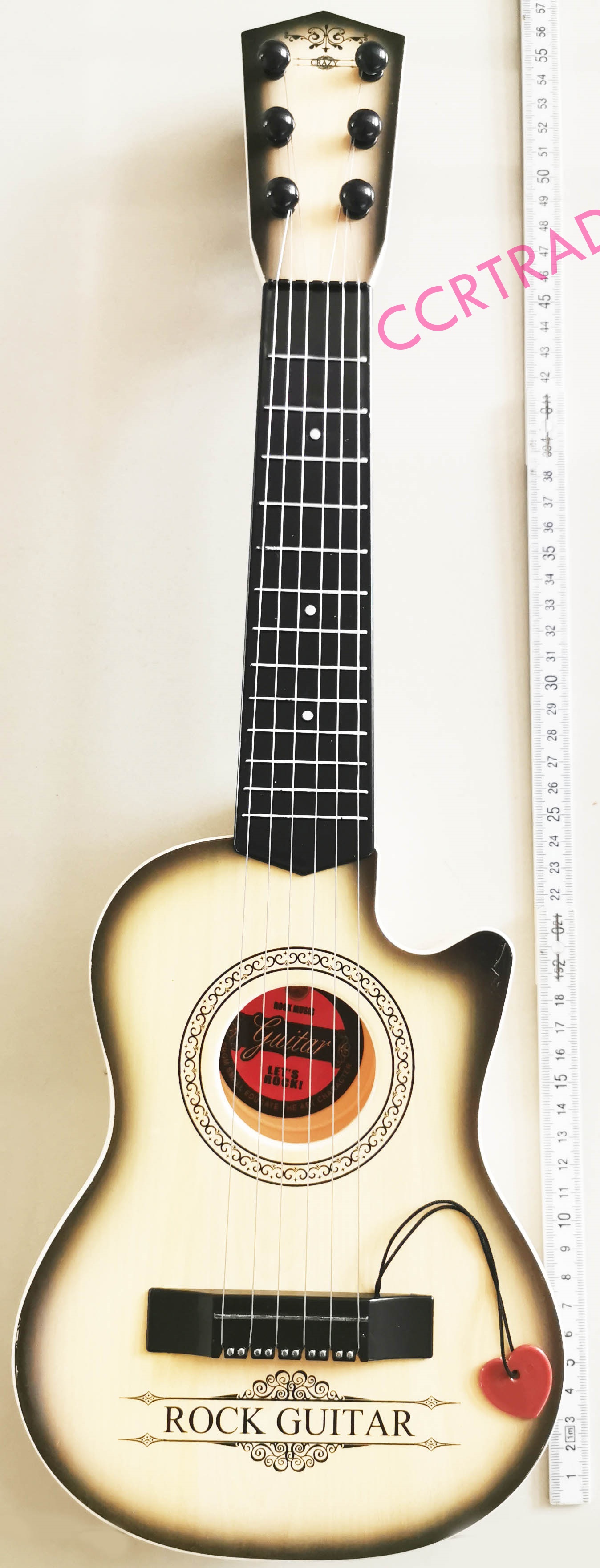 กีต้าร์ร็อคพลาสติกลายไม้กล่องใหญ่ 54.5 ซม.(1x3)