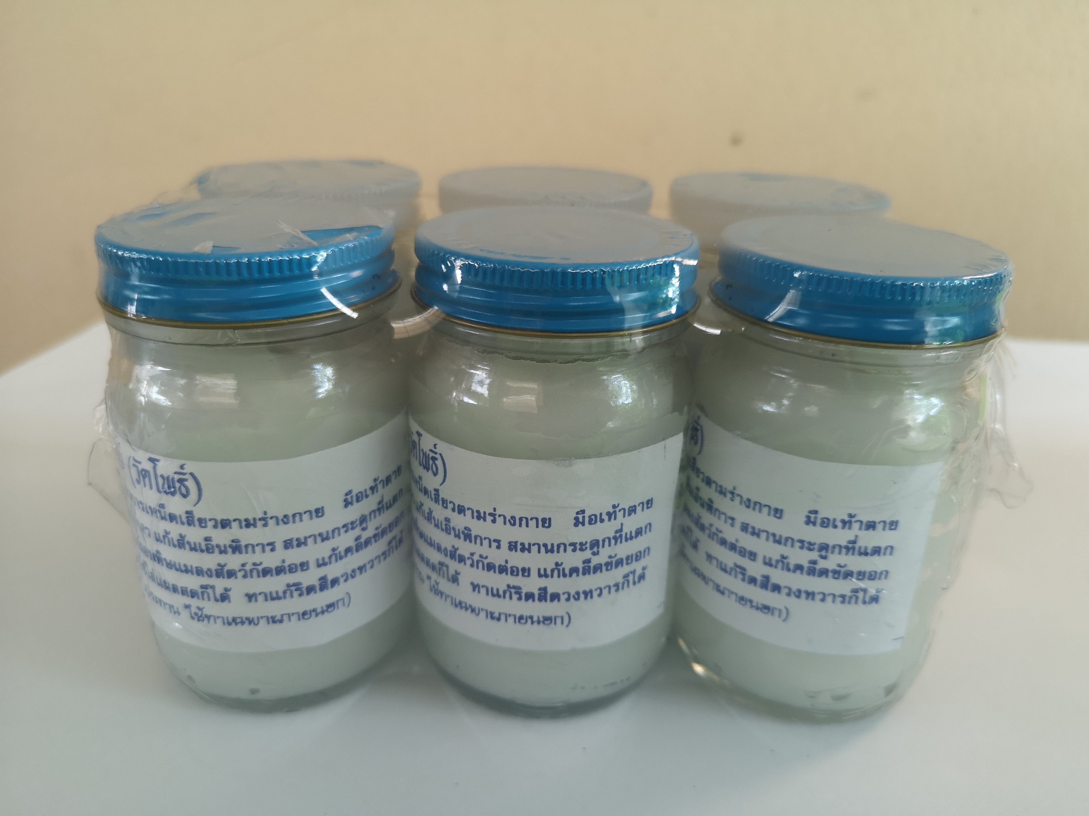 น้ำมันโอสถทิพย์-วัดโพธิ์ สีขาว น้ำหนัก 100 กรัม/ขวด (Pack 1 x 6 ขวด)