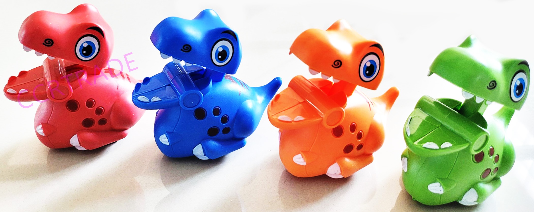 ไดโนเสาร์สีสดกดซิ่งกล่อง 8x8.5 ซม.(งานห้าง)