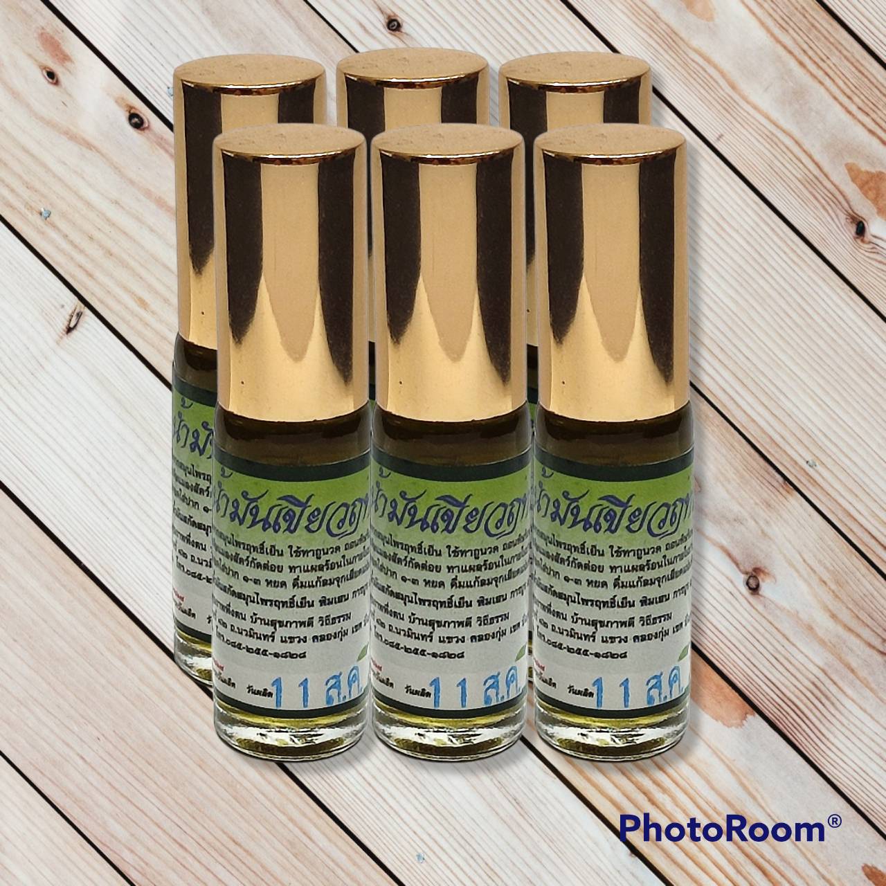 น้ำมันเขียวฤทธิ์เย็นไหมตะวันเดือนแบบลูกกลิ้ง (แพค 6 ขวด)