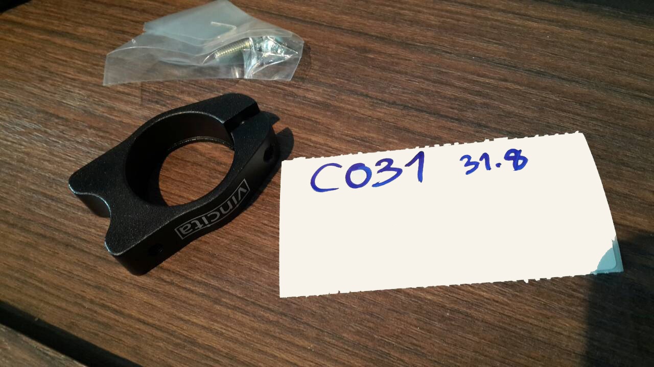 VINCITA : C031 รัดหลักอานพร้อมรูยึดตะแกรง 31.8 มม.