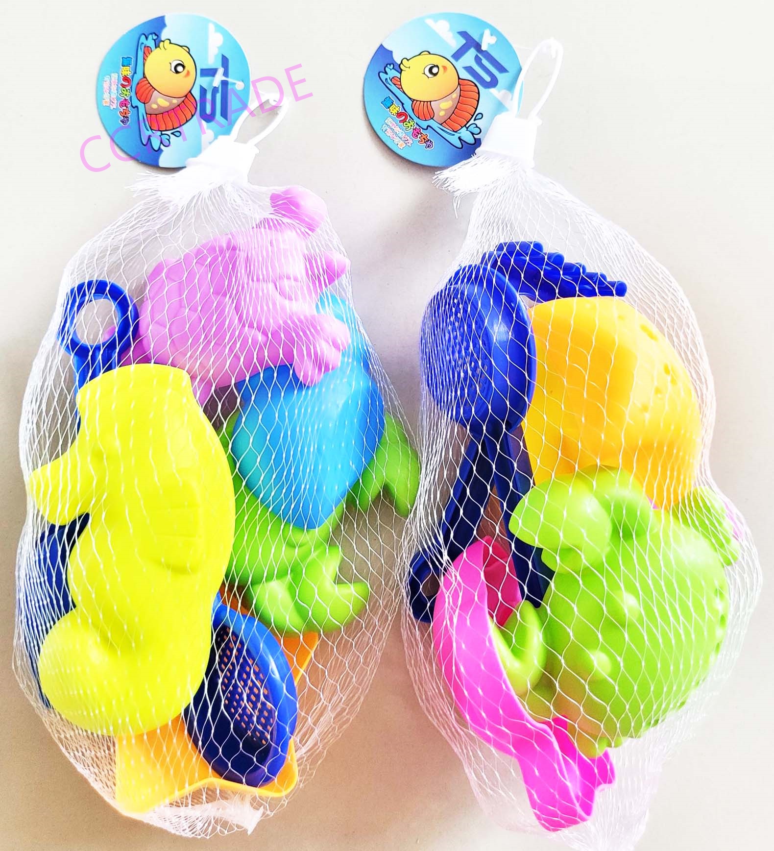 ชุดเล่นทรายพาสเทล 7 ชิ้นถุงตาข่าย 22 ซม.