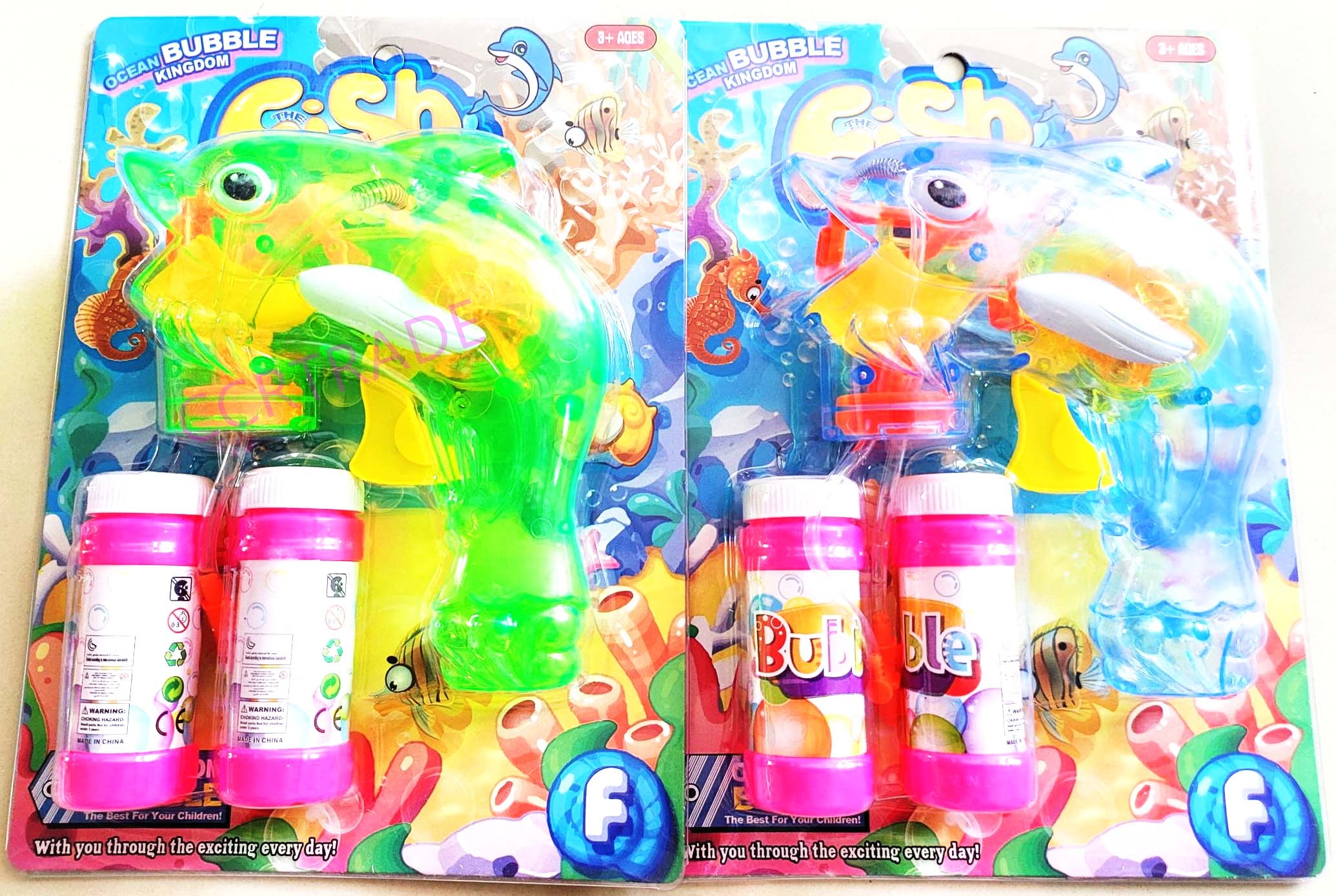 ปืนเป่าฟองโลมาสีใส+น้ำยา 2 ขวด มีไฟแผง 19.5x26 ซม.(1x3)