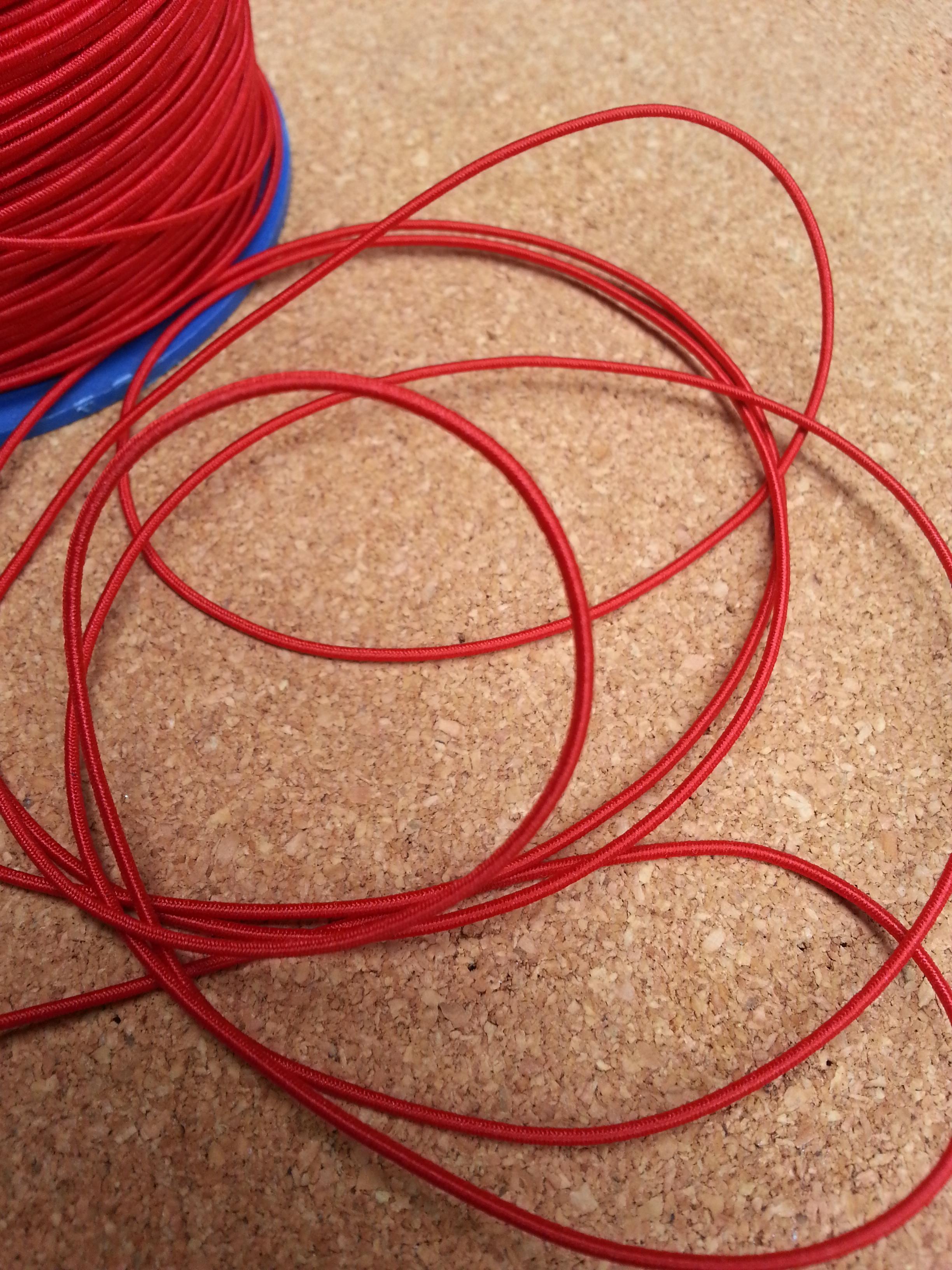 เชือกยางยืด 1 มม. ( ดำ-ขาว-แดง )