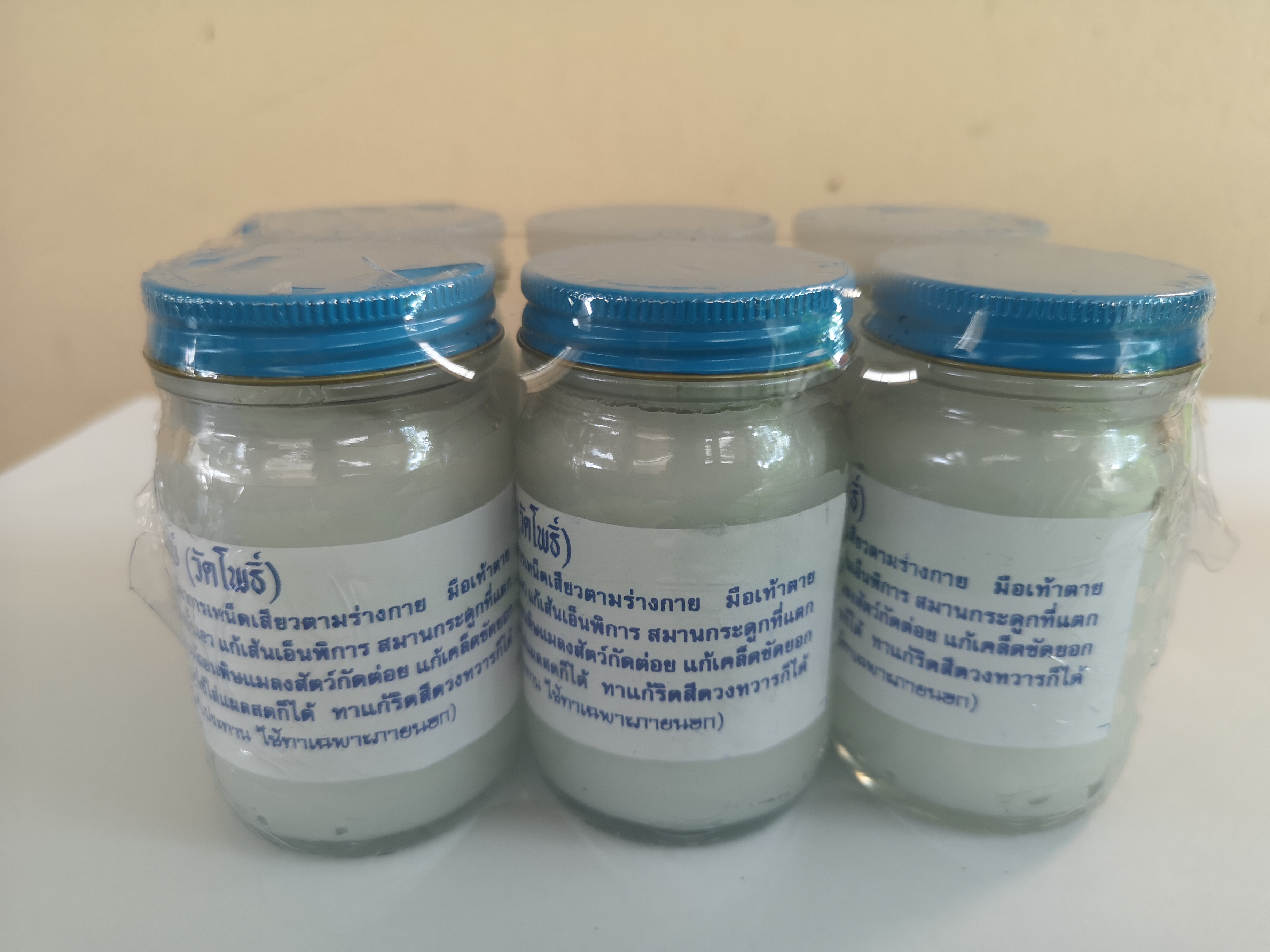 น้ำมันโอสถทิพย์-วัดโพธิ์ สีขาว น้ำหนัก 100 กรัม/ขวด (Pack 1 x 6 ขวด)