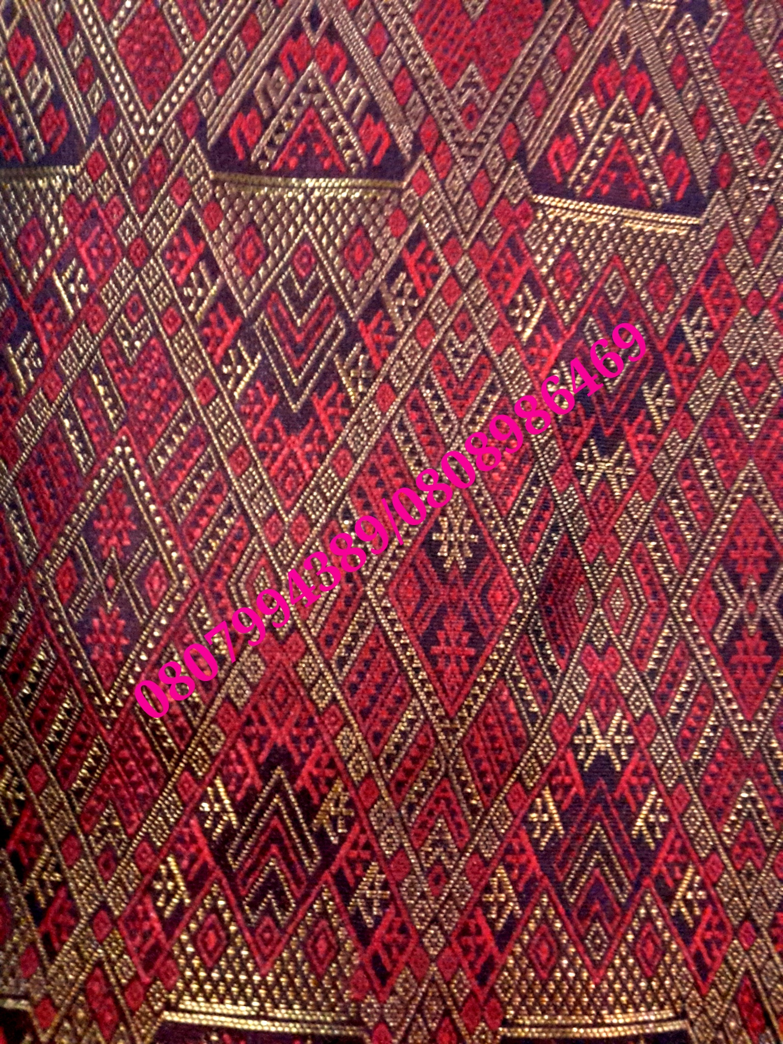 ผ้าซิ่นสำเร็จรูปผ้าซิ่นลาวแบบป้ายเลื่อนตะขอ ผ้าถุงสำเร็จรูป ผ้าซิ่นตีนจกไหมลาวสีแดงเลือดนกเมทอลลิค