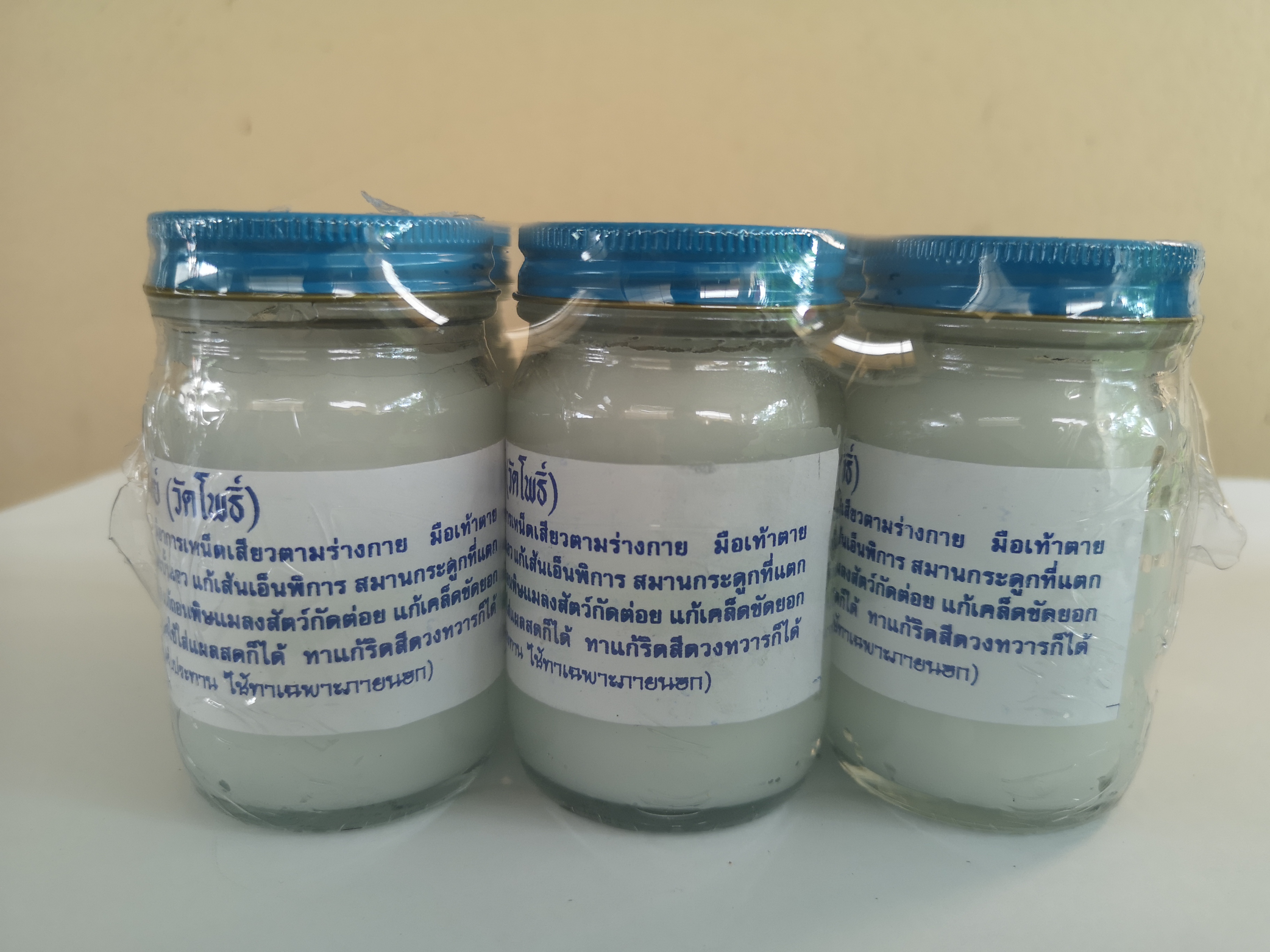 น้ำมันโอสถทิพย์-วัดโพธิ์ สีขาว น้ำหนัก 100 กรัม/ขวด (Pack 1 x 6 ขวด)