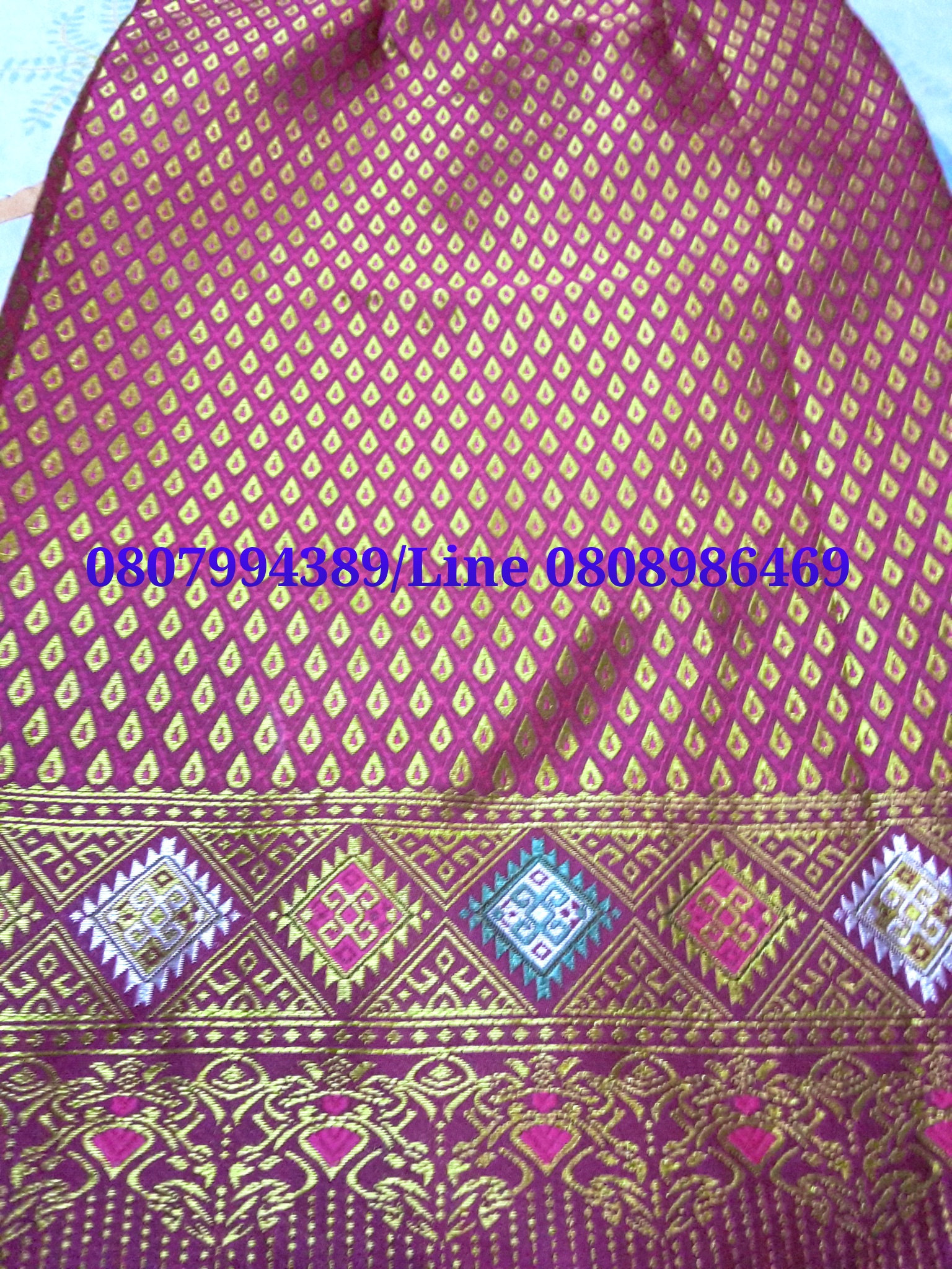 ผ้าซิ่นสำเร็จรูปผ้าซิ่นลาวแบบป้ายเลื่อนตะขอ ผ้าถุงสำเร็จรูป ผ้าซิ่นตีนจกไหมลาวสีชมพูเมทอลลิค