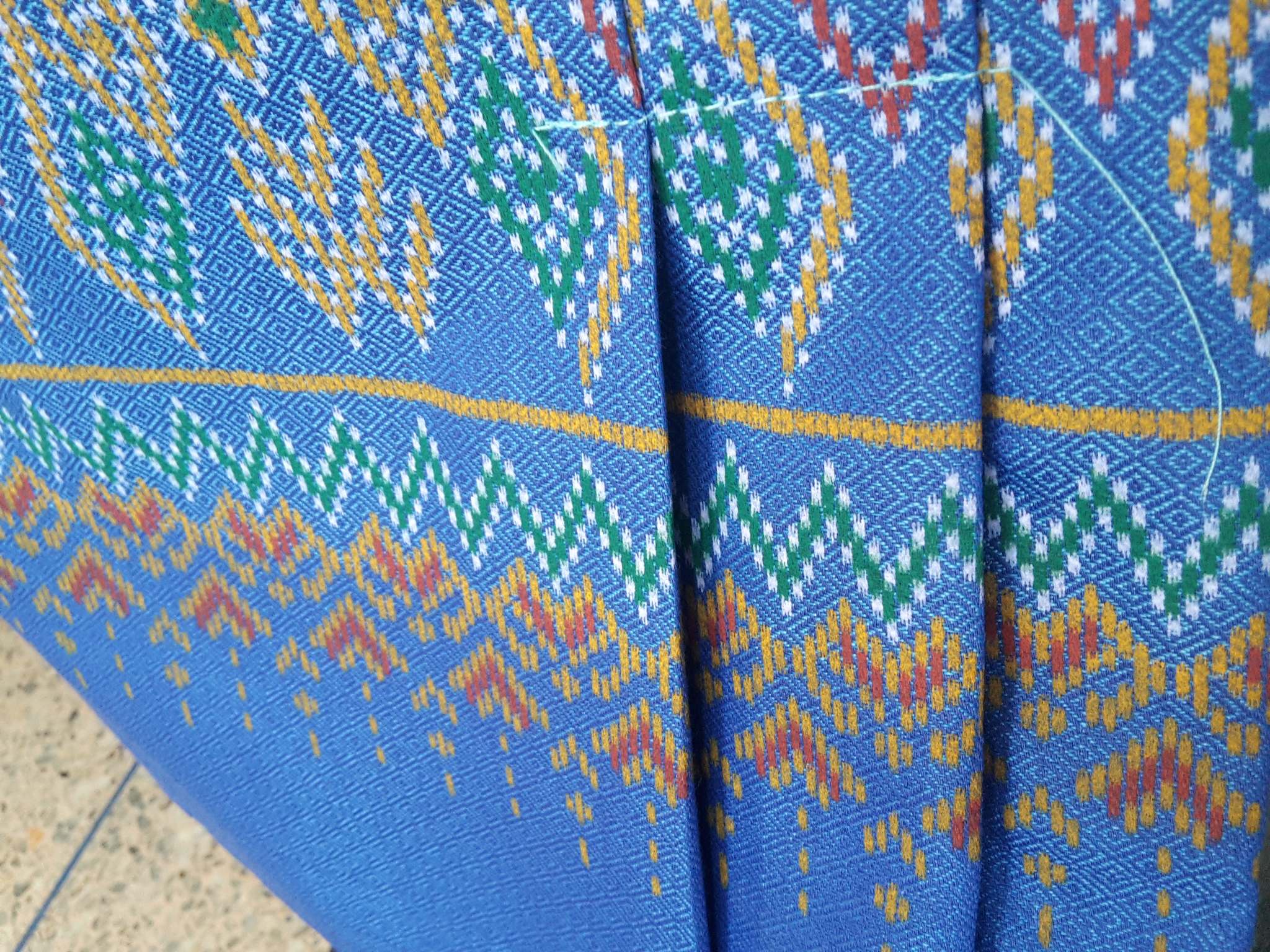 ผ้าซิ่นสำเร็จรูปผ้าซิ่นผ้าฝ้ายสีฟ้า แบบป้ายแต่ง 3 จีบกระดุมกระลา ผ้าถุงสำเร็จรูปสีฟ้า ผ้ามัดหมี่แพรวาสำเร็จสำเร็จรูป