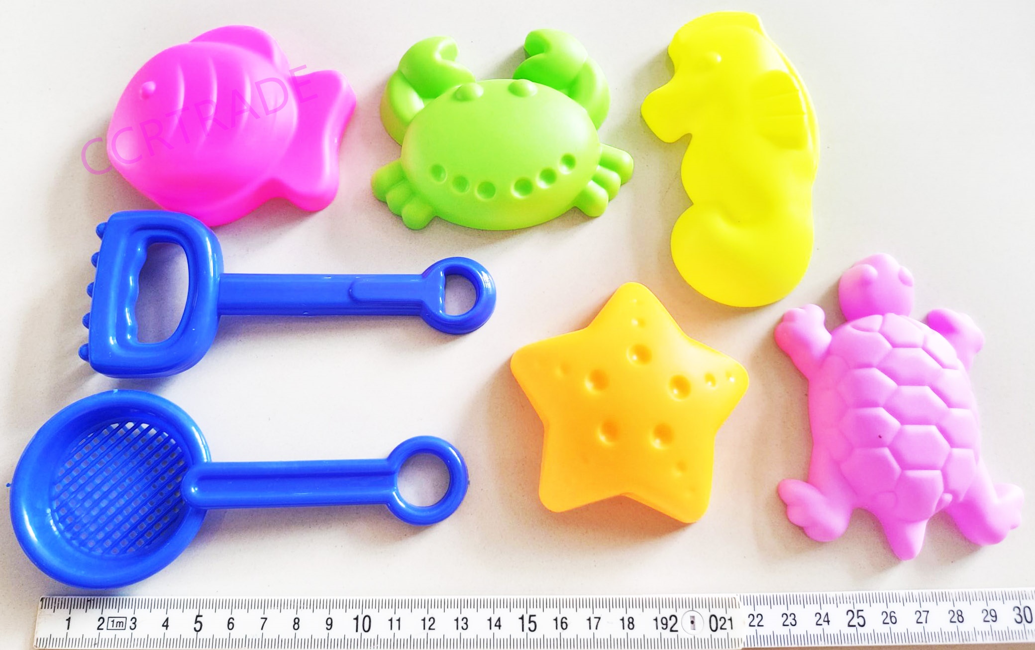 ชุดเล่นทรายพาสเทล 7 ชิ้นถุงตาข่าย 22 ซม.