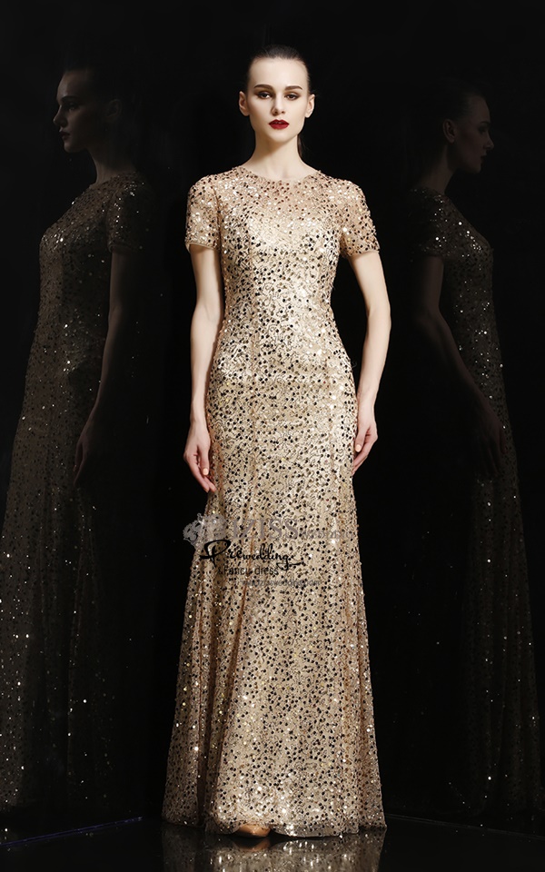 T010 **พรีออเดอร์เดรสชุดเลื่อมสีทอง**ชุดราตรียาวเลื่อมสีทองทั้งชุด แขนสั้น เล่นดีเทลซีทรูช่วงอกและแขน ตกแต่งเลื่อมสีทองหลายขนาด เข้ารูป สวยงามหรูหราไฮโซมากๆ ค่ะ